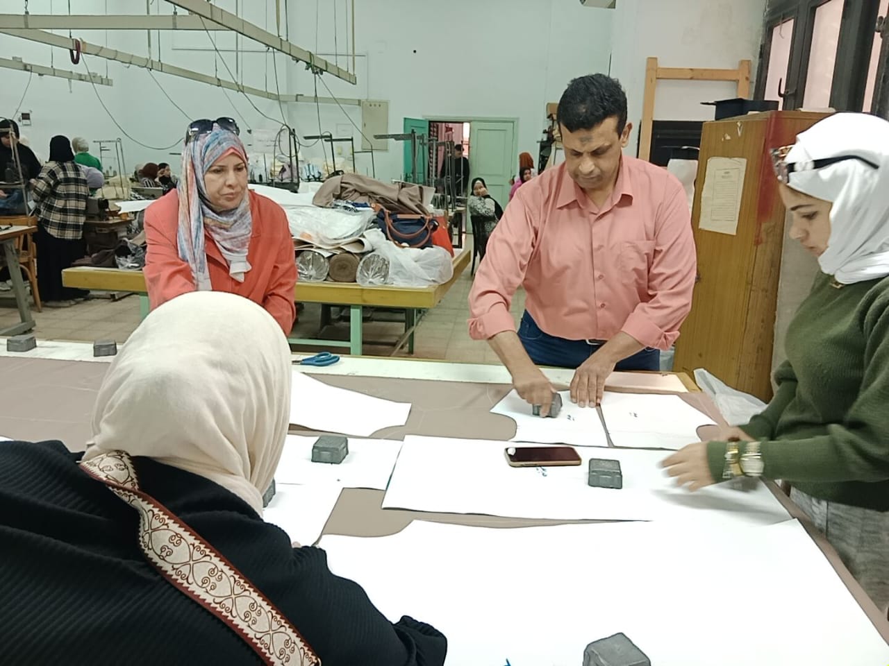  Helwan University Home Economics Students Make Their Mark on the Campus Work Environment by Producing Staff Uniforms