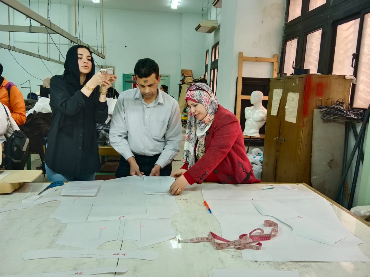  Helwan University Home Economics Students Make Their Mark on the Campus Work Environment by Producing Staff Uniforms